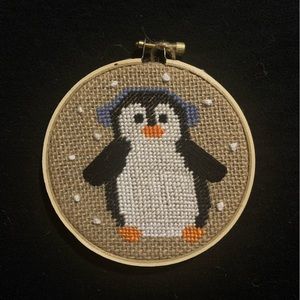 Penguin Crossstitch on burlap